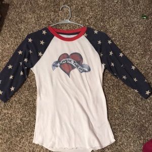 It is a cowgirl tuff American flag shirt in very good condition